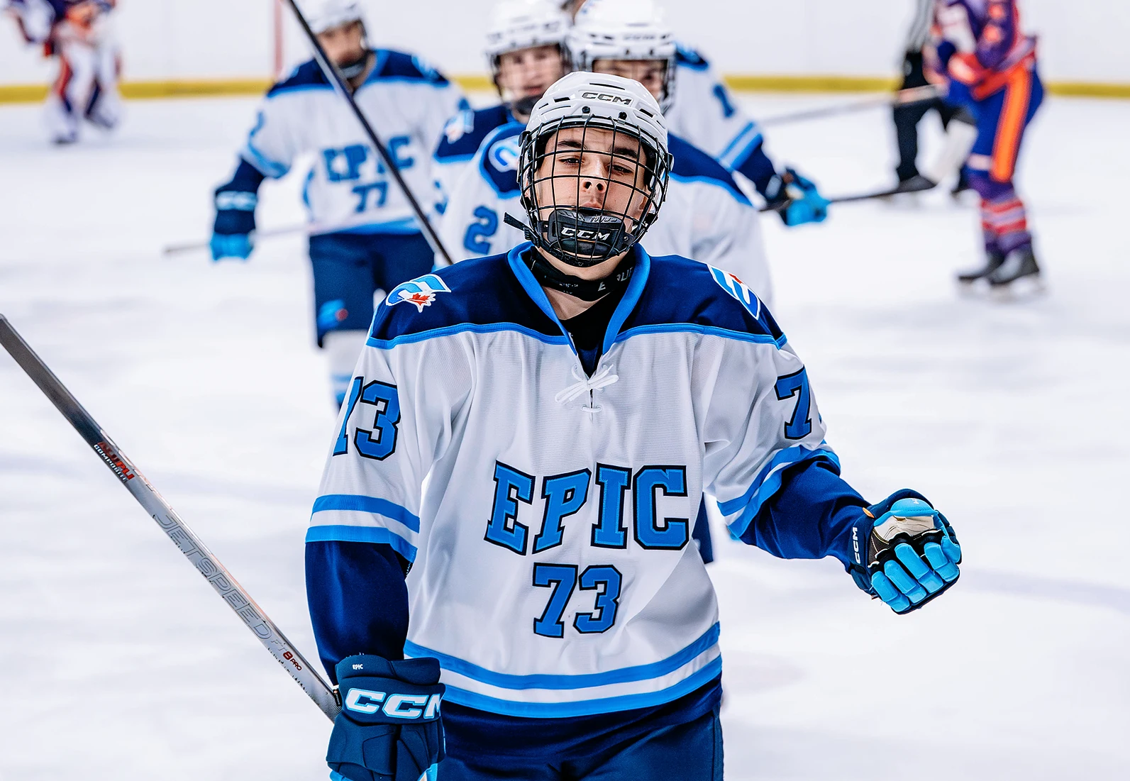 hockey player on ice celebrating a goal