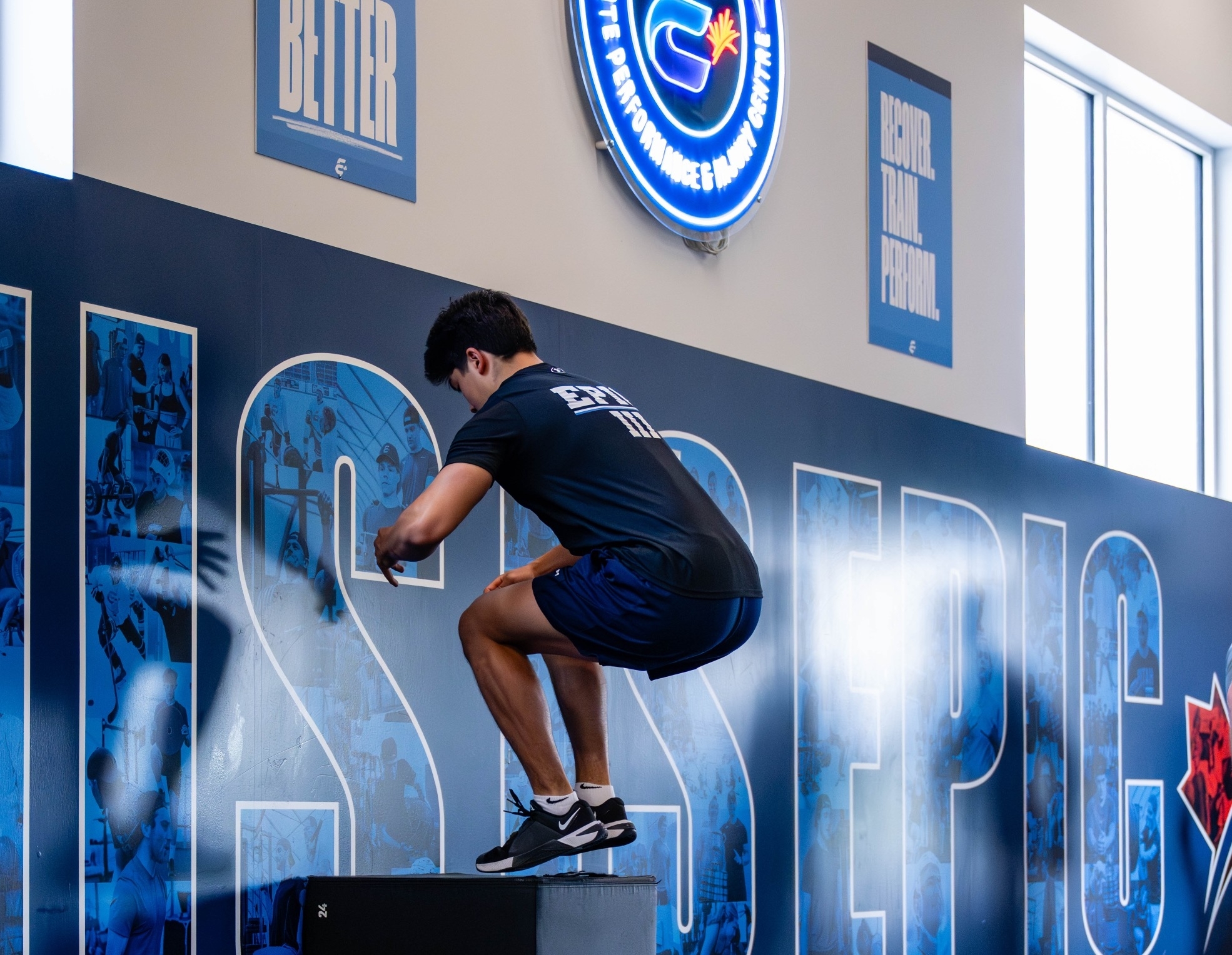 Player jumps onto box in EPIC gym