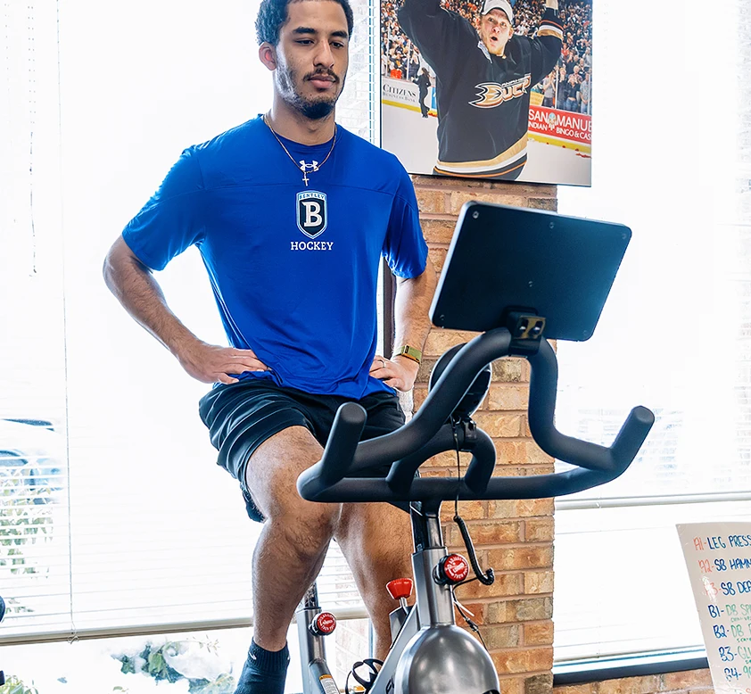 athlete riding pedal bike