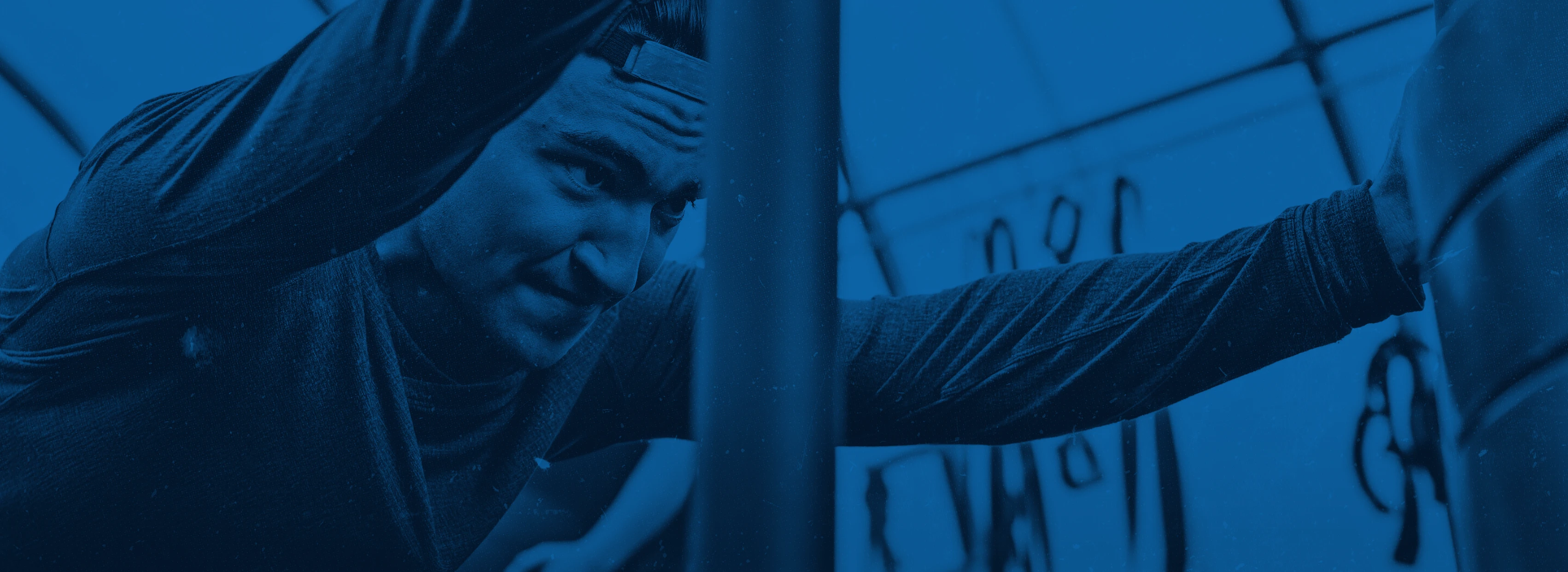 athlete strength training pushing skid plates