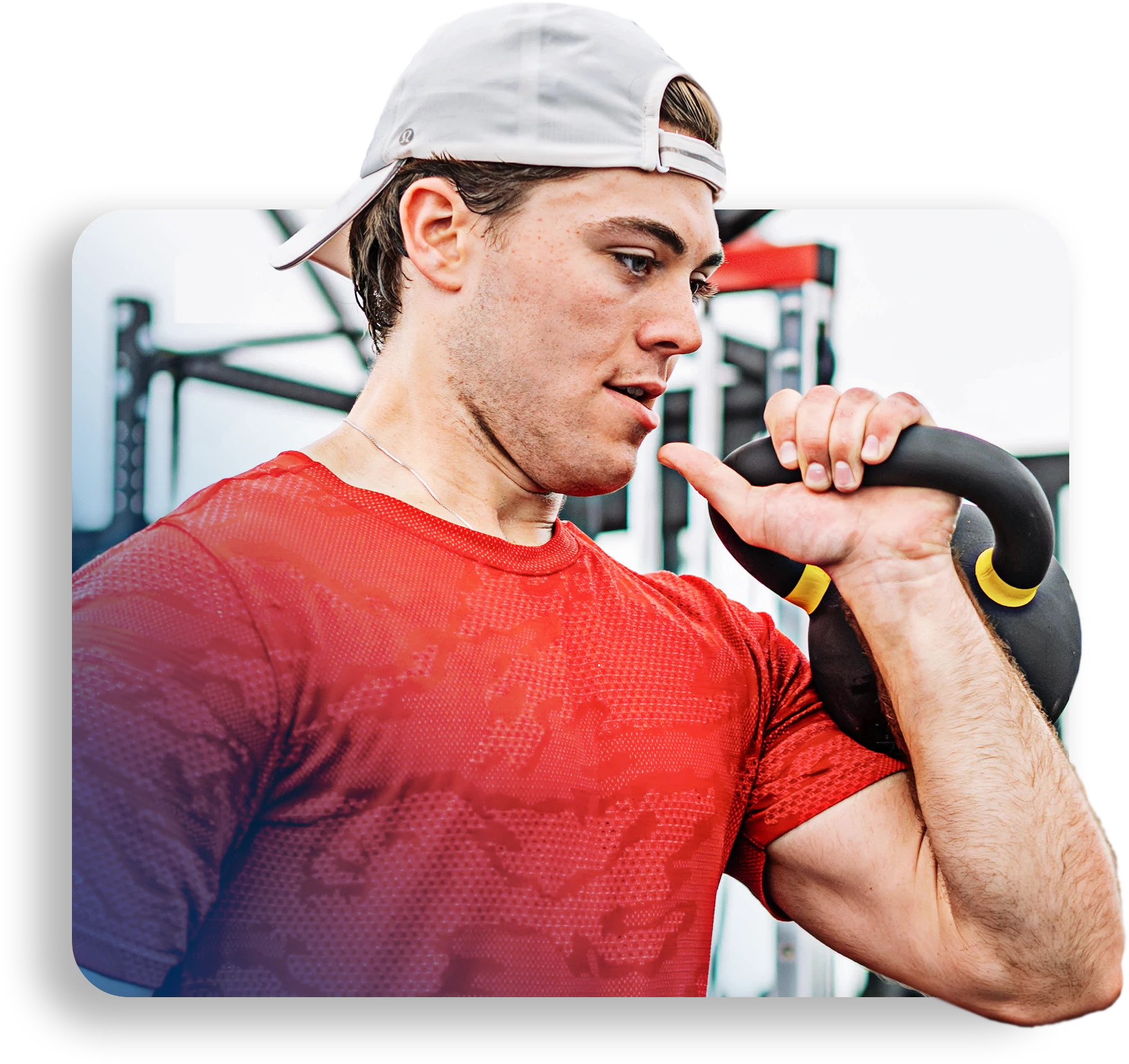 person lifing kettle bells