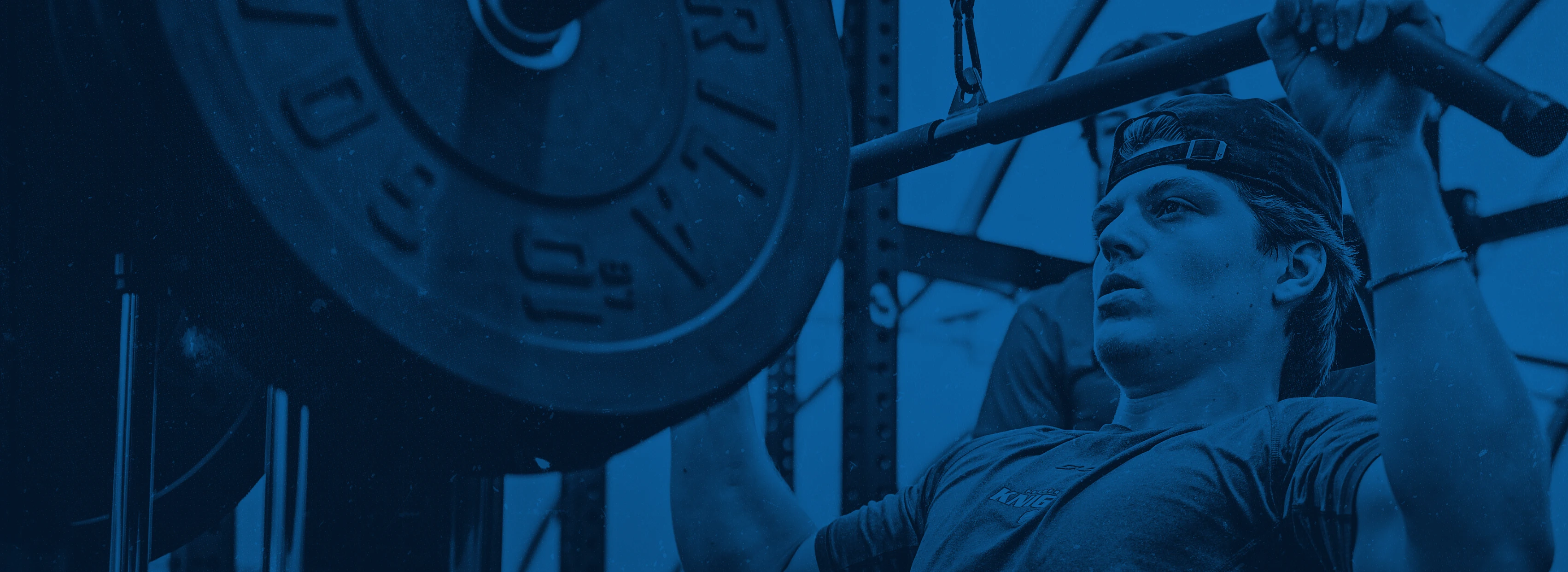 person training with pull down weights