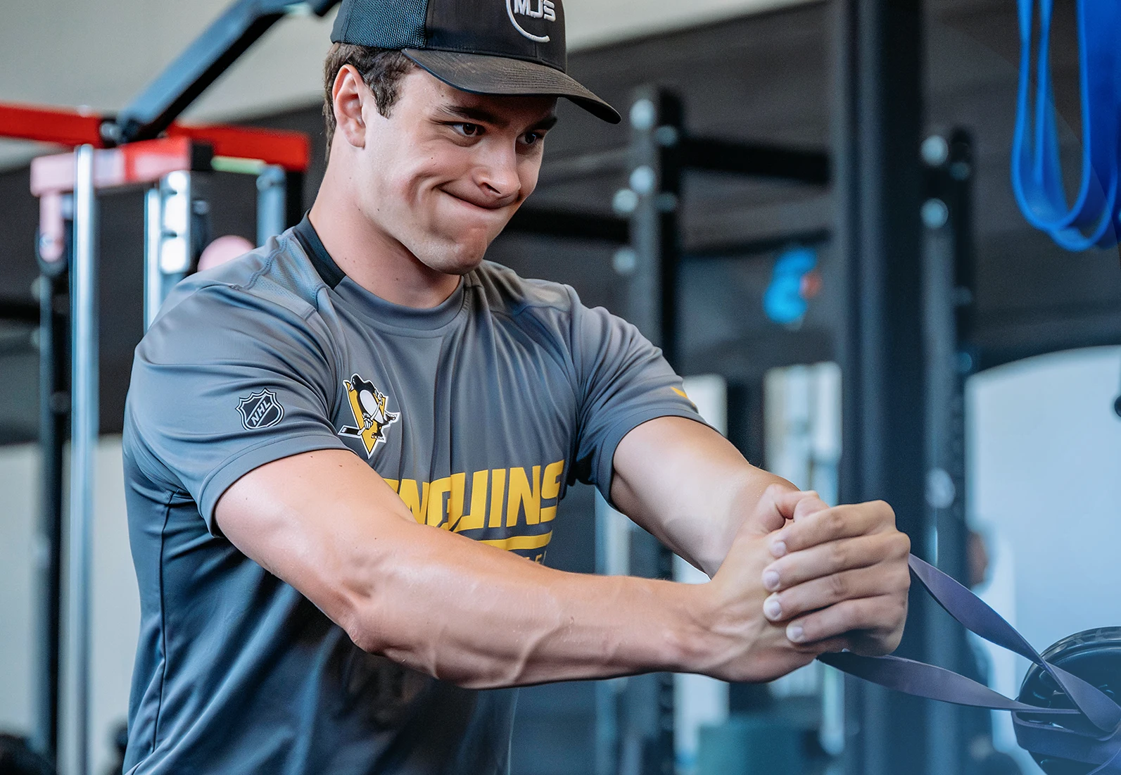 person strength training with weights